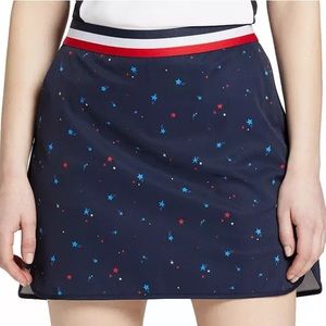 LADY HAGEN | Women's Contrast Trim Golf
Skort in Red and Blue Stars Print